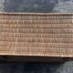 Old braided wicker trunk