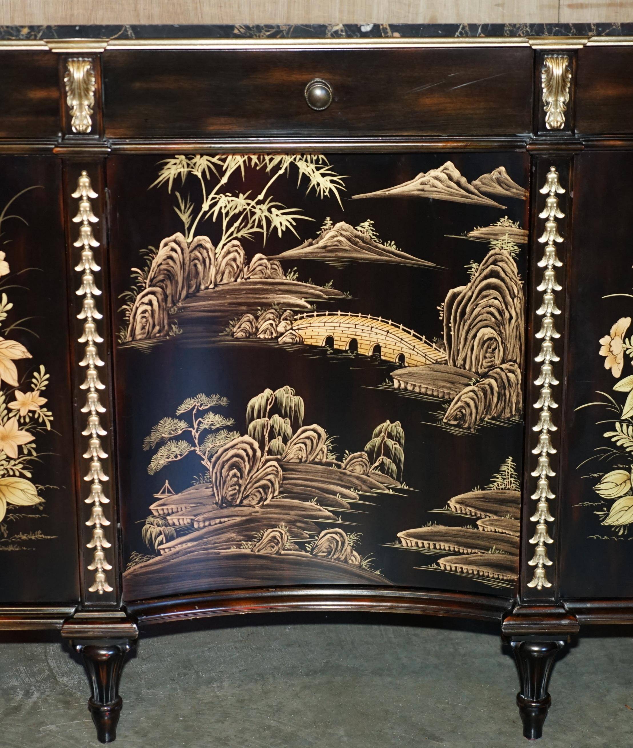 Contemporary Chinese buffet with a marble top and space for a mini-fridge.