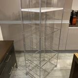 Modular wall bookshelf desk in vintage chrome.