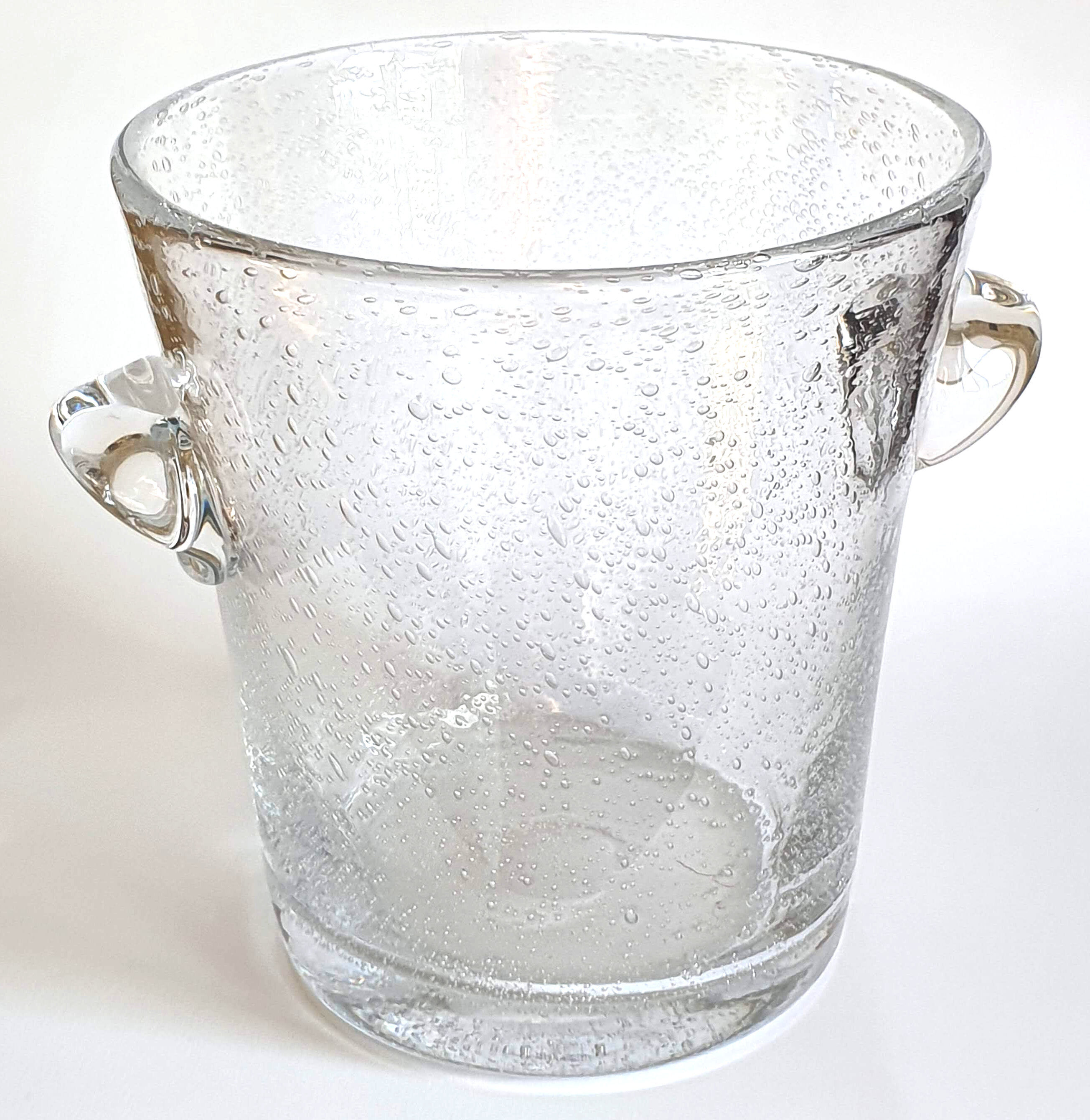 Champagne bucket in glass of biot