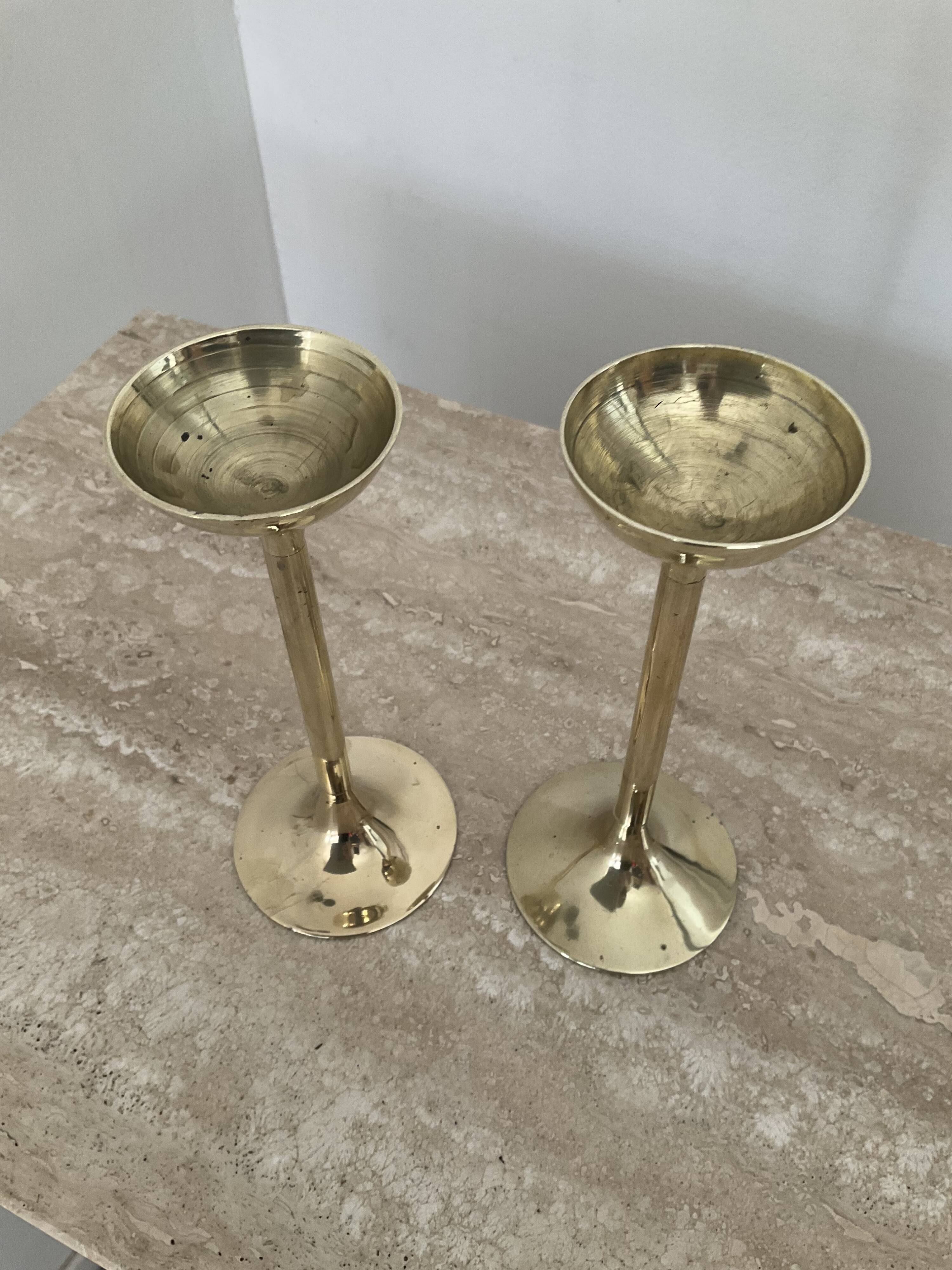 Pair of antique bronze candle holders