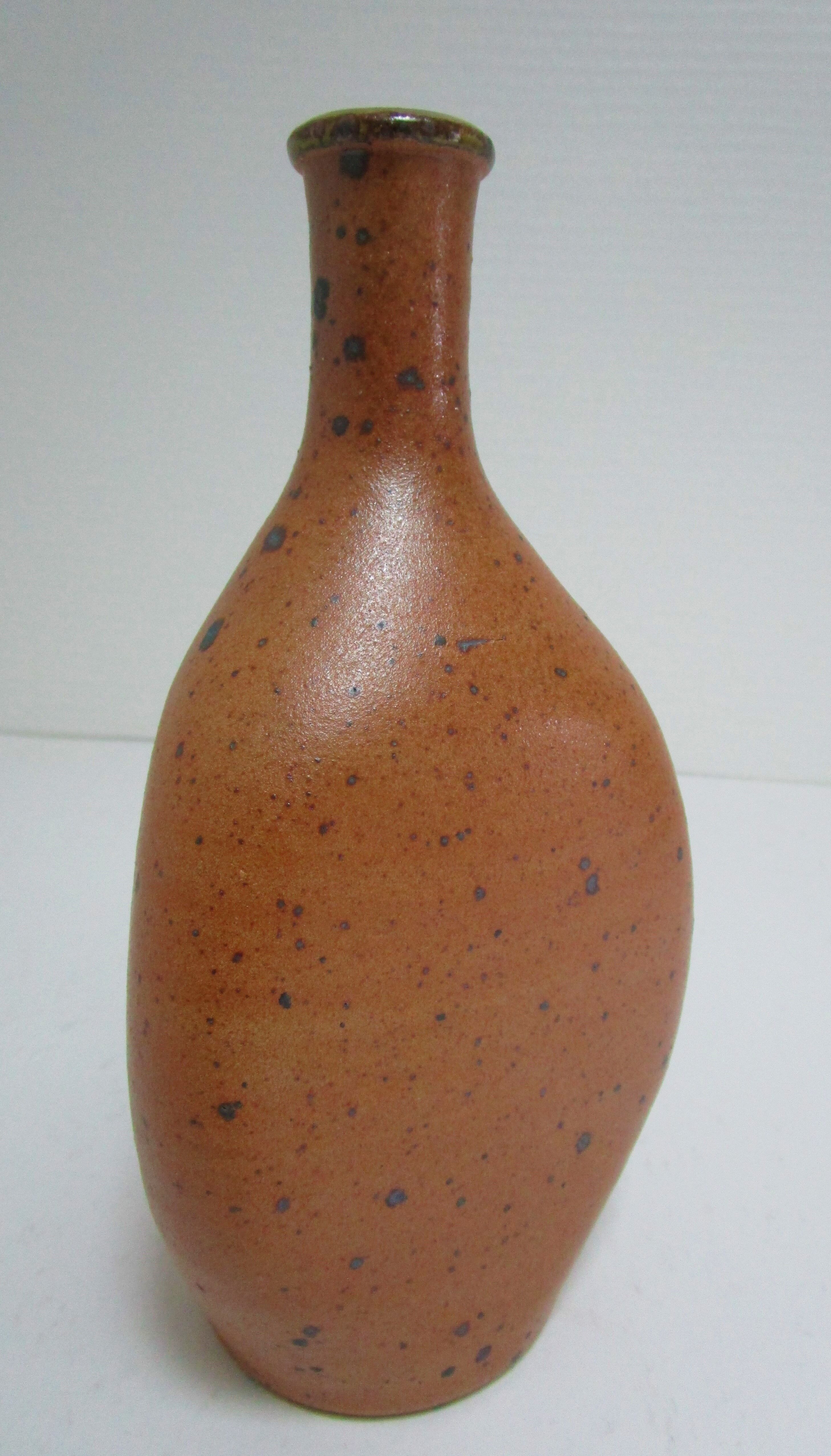 Soliflore vase in pyrite sandstone with three vintage faces