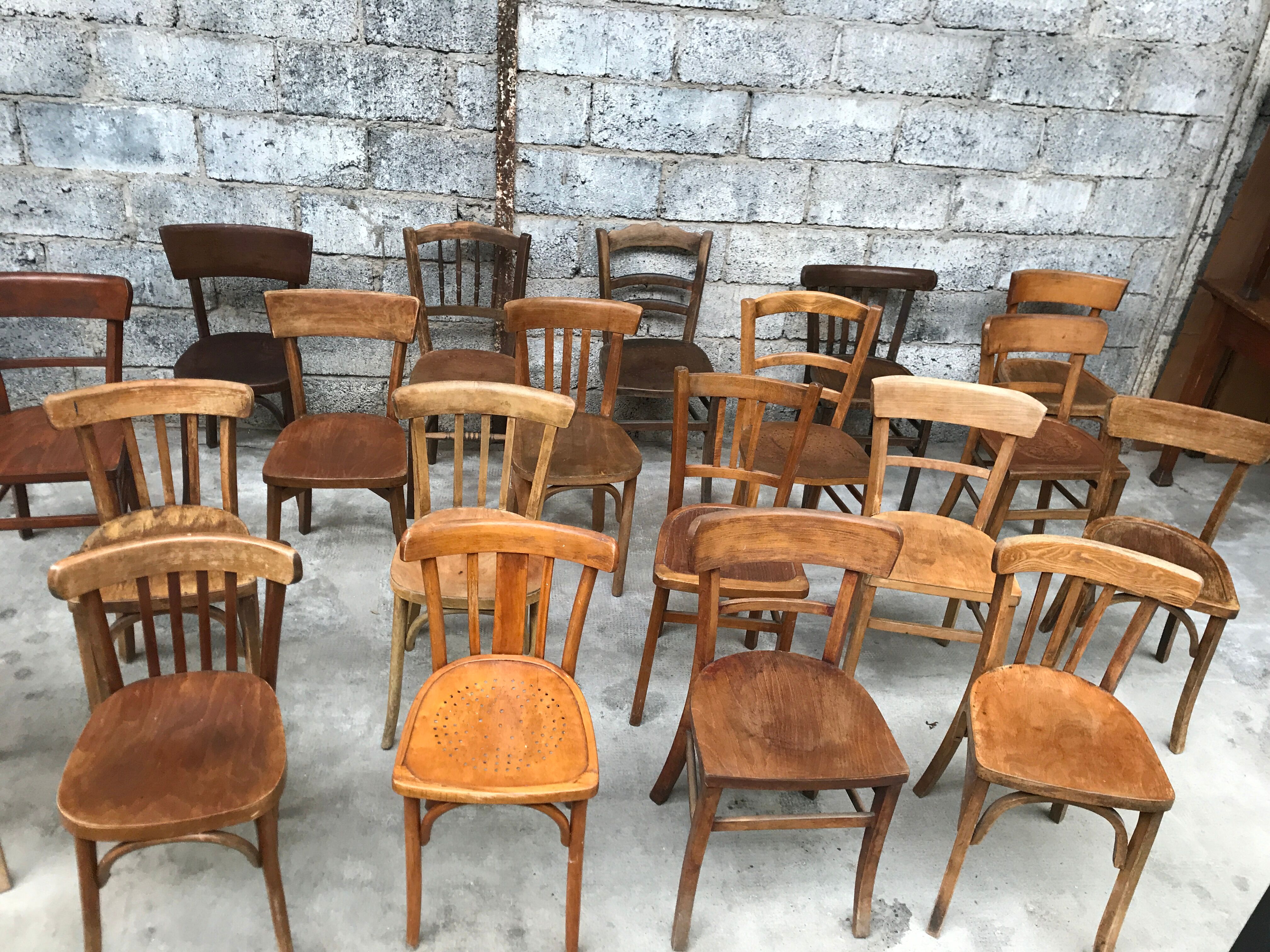 Set of 15 mismatched curved wood bistro chairs