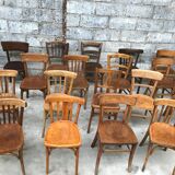 Lot of 15 mismatched bistro chairs in curved wood