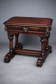 Ancient Flemish Gothic desk. Solid oak with richly carved dolphins.