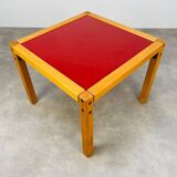 Table basse Flötotto Profilsystem années 70 rouge
