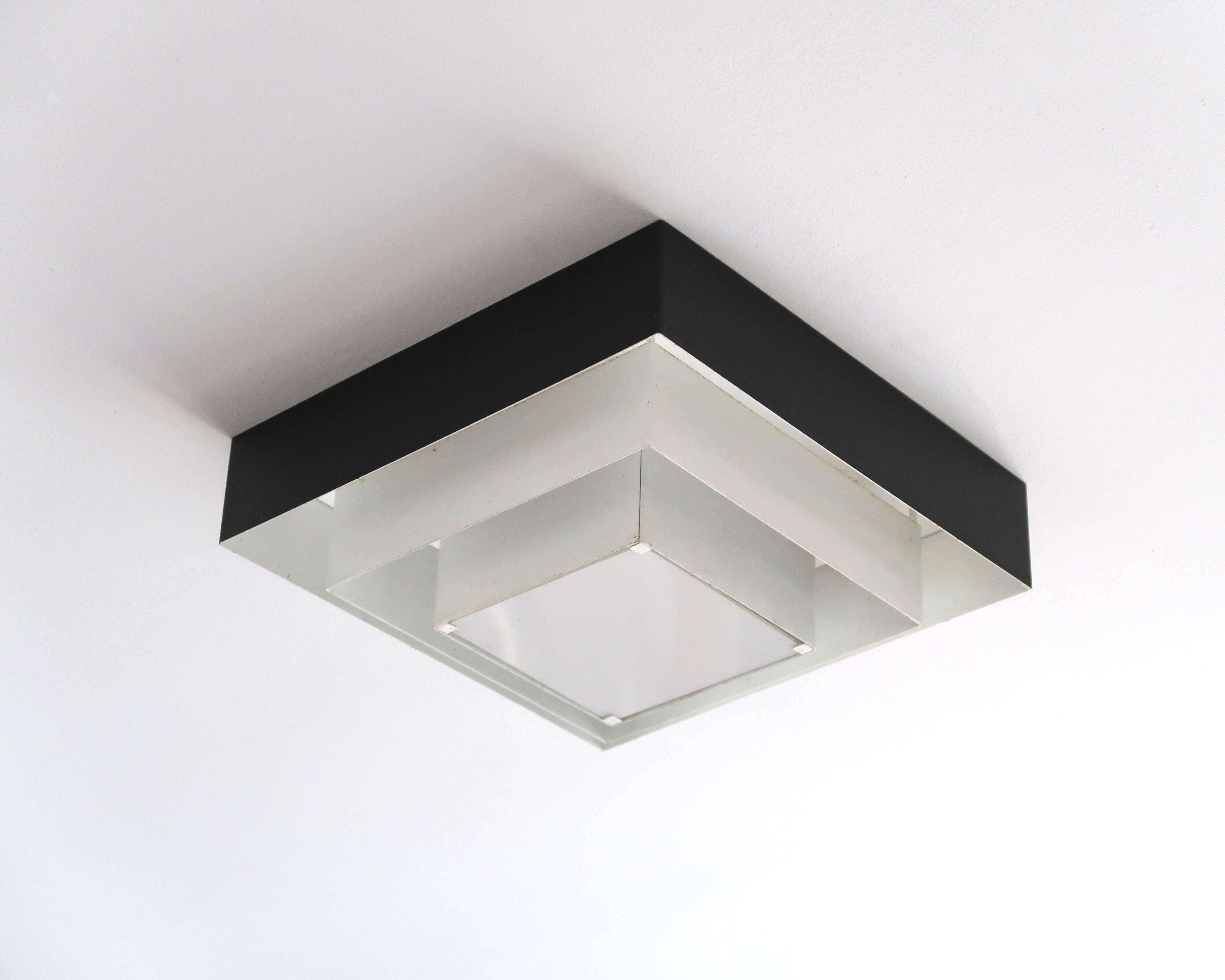 Ziggurat ceiling light Raak Amsterdam in black and white metal, 1960s.