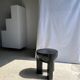Black mango wood tripod side table with a semi-spherical top, height: 45 cm, diameter: 44 cm.
