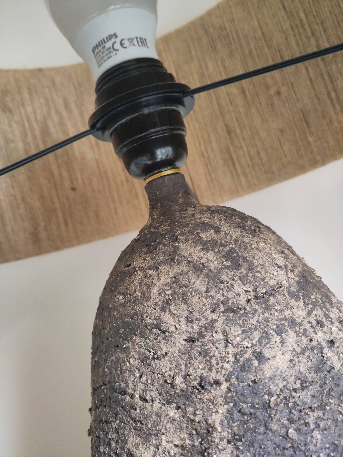 Table lamp in stoneware and natural jute