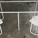 Vintage70's, Emu table in metal and glass, chairs swivelling under the table