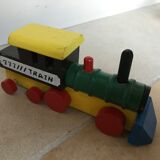 Small vintage train in multicolored wood