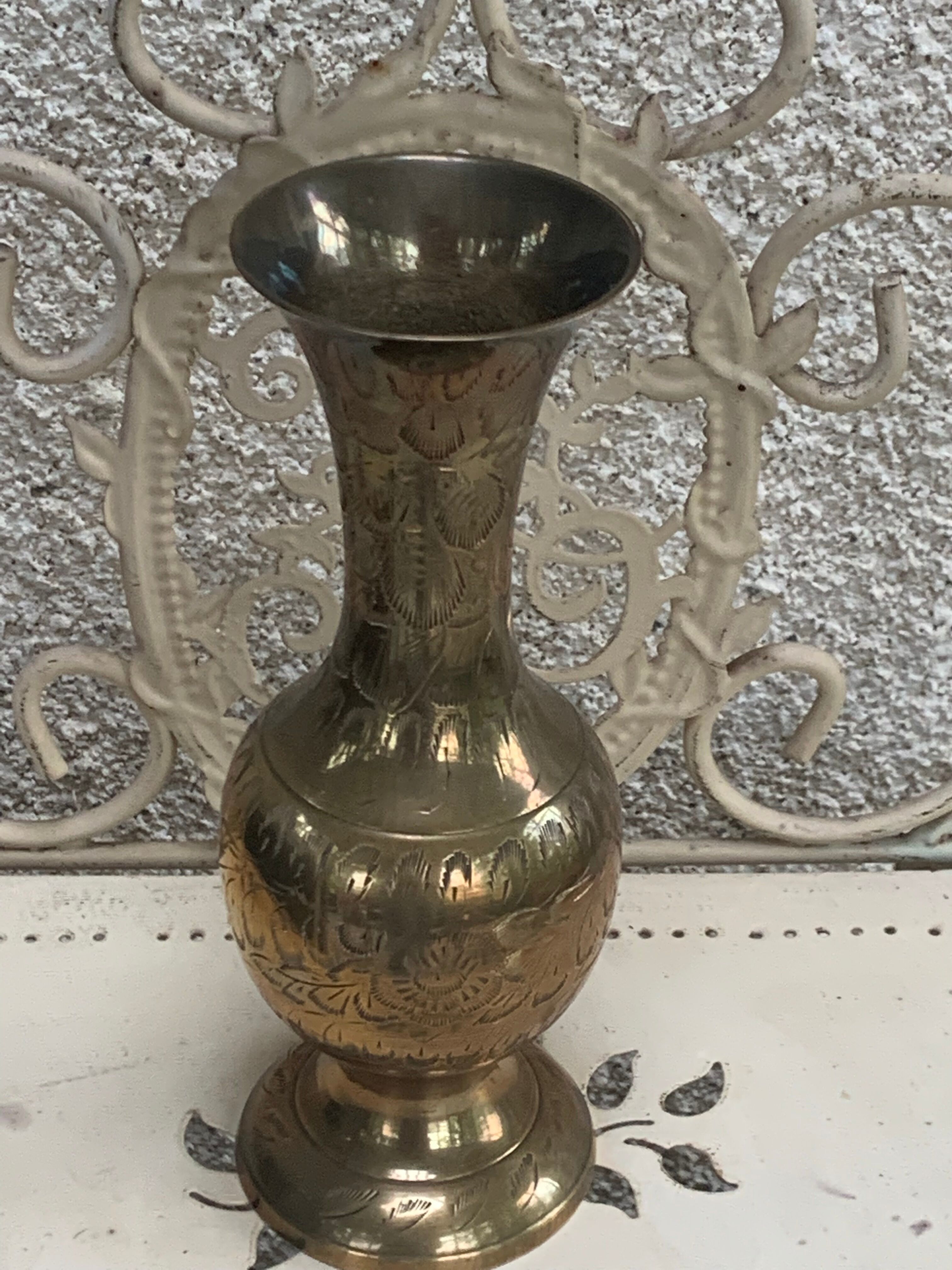 Golden brass vase chiseled vintage floral pattern