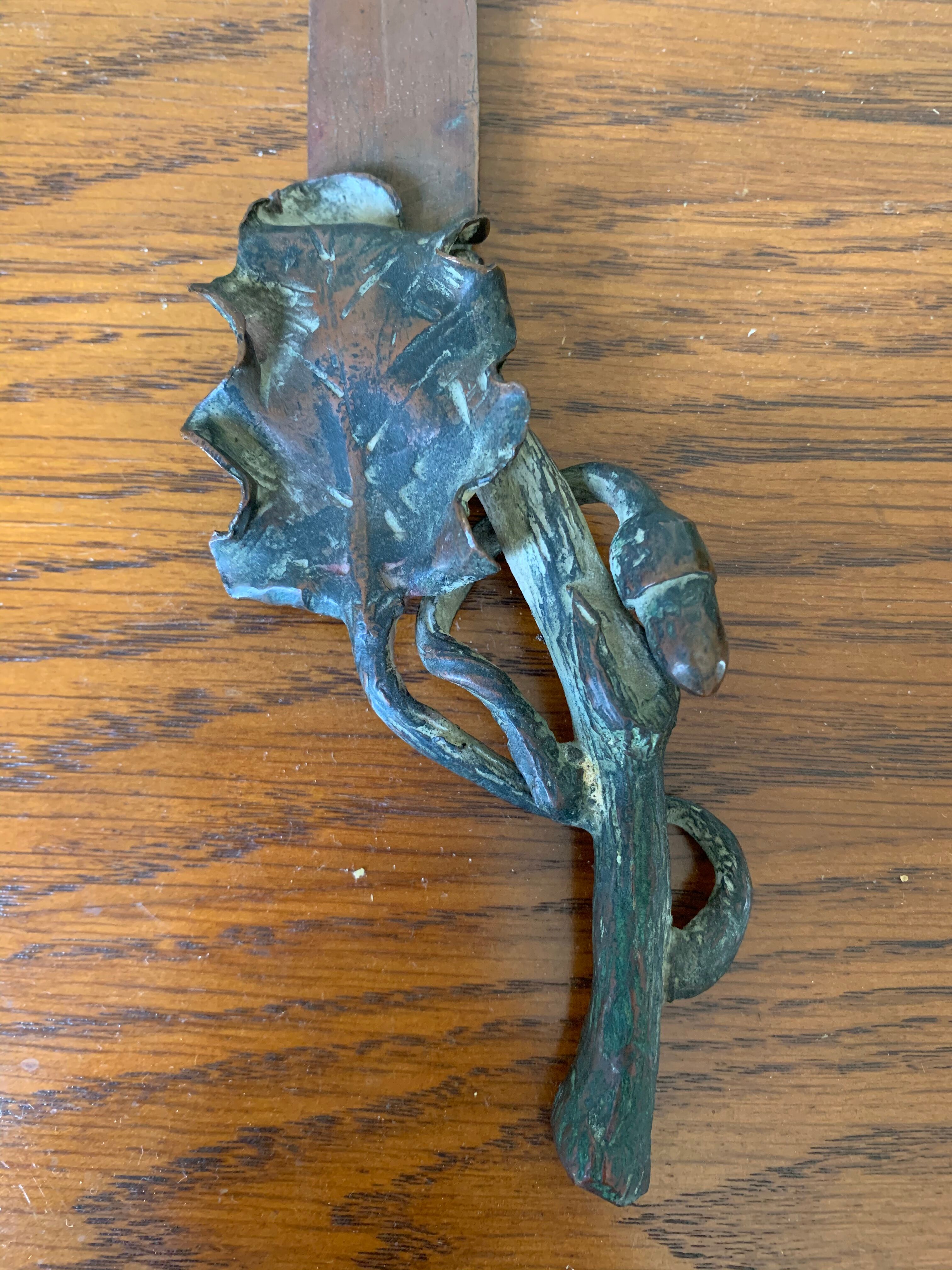 Letter opens, oak leaf