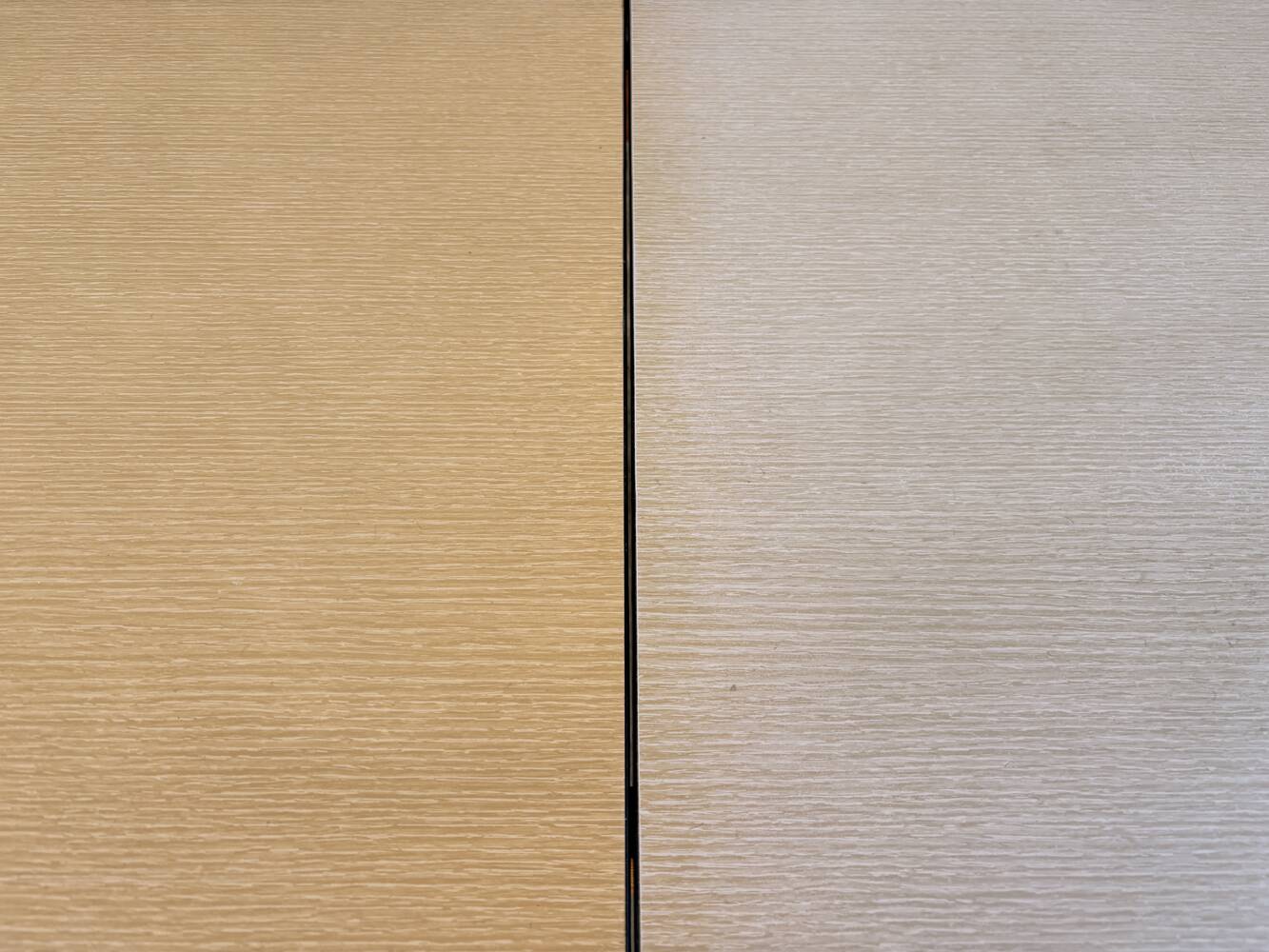 Beige French modernist extendable table, wooden legs, circa 1955.