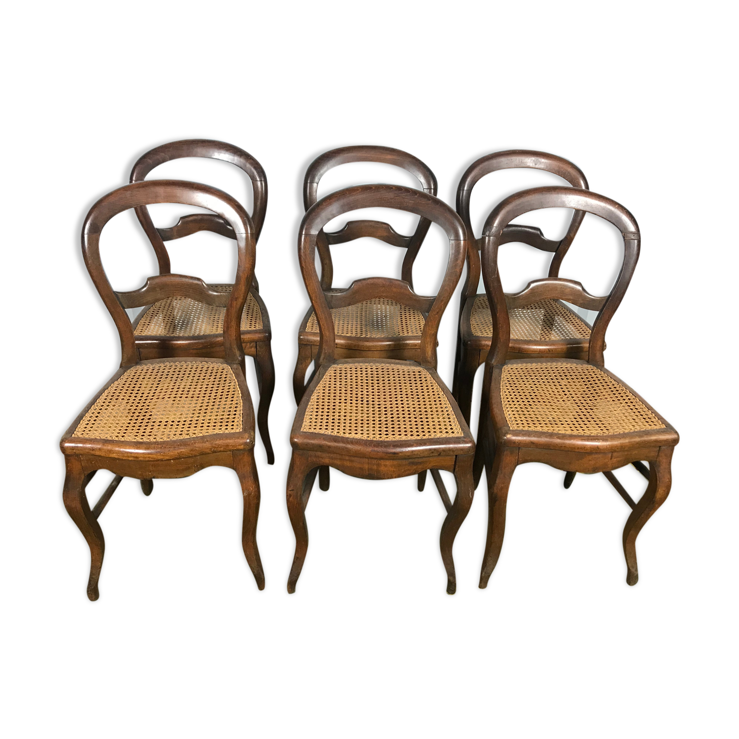 Suite de 6 chaises Louis Philippe en noyer et cannage 19eme