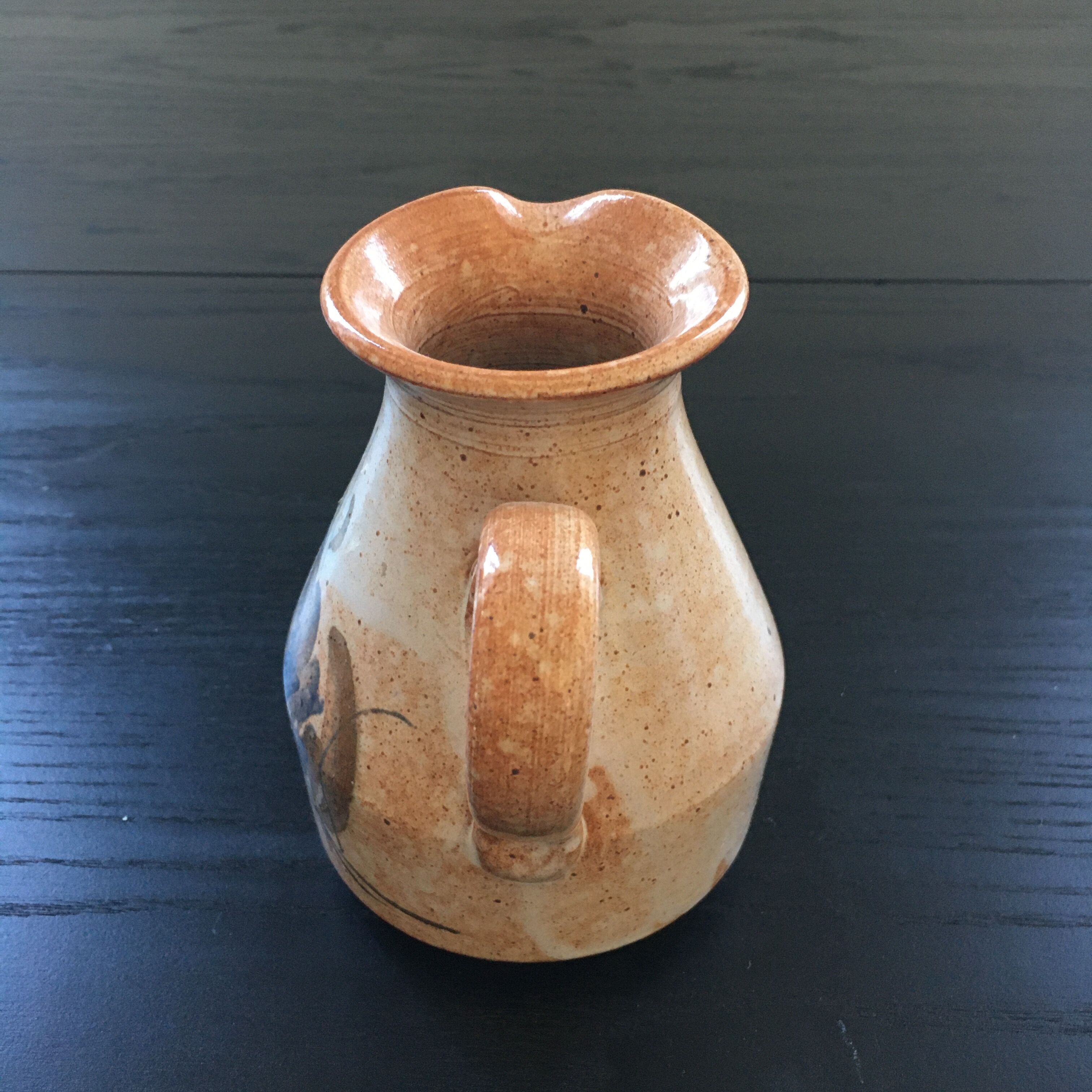 Pitcher beige floral decoration