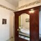 Mahogany inlaid wardrobe with a mirror