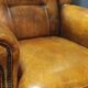 Robust vintage sheepskin armchair
