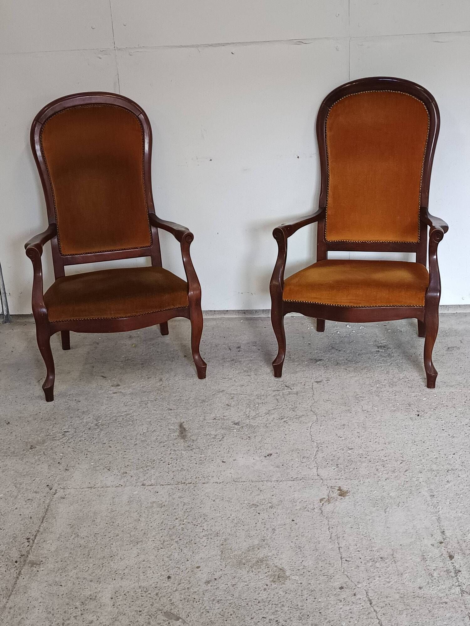 pair of Voltaire armchairs
