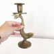 Old golden brass fish candlestick