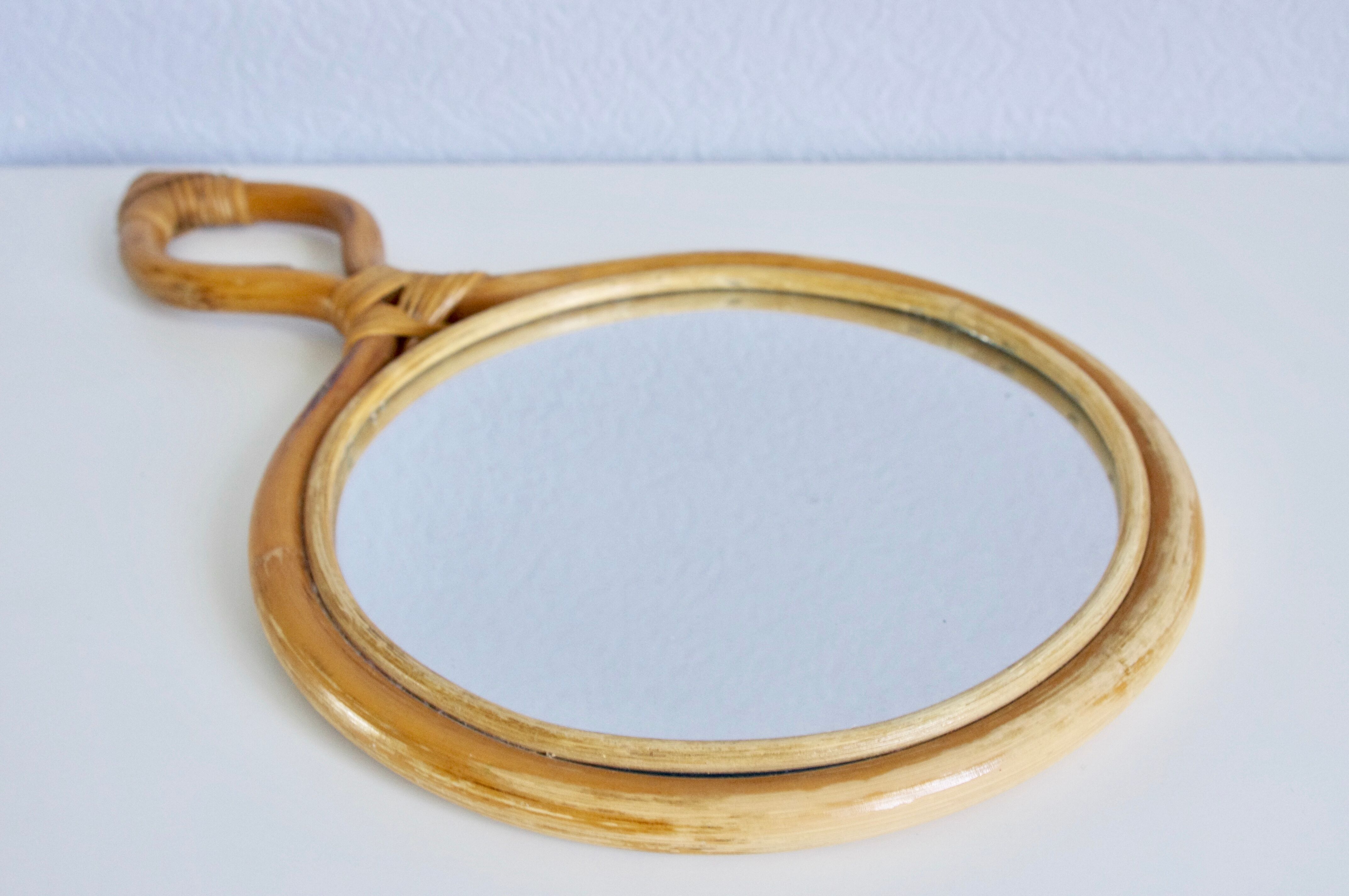 Rattan hand mirror 22x38cm