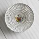 Openwork porcelain fruit bowl.