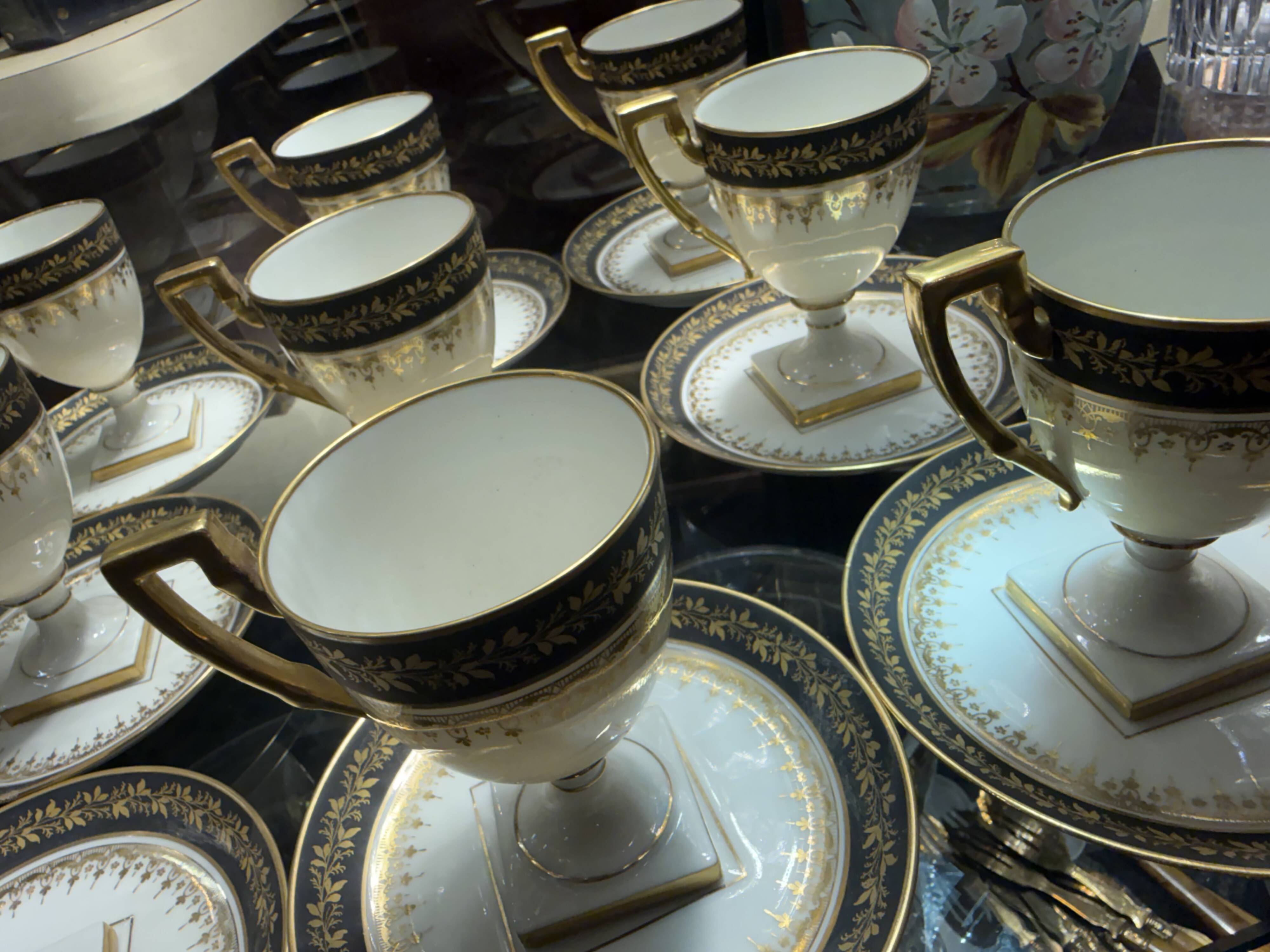 Coffee service for 12 cups Empire, Limoges porcelain, brand "A.F.", circa