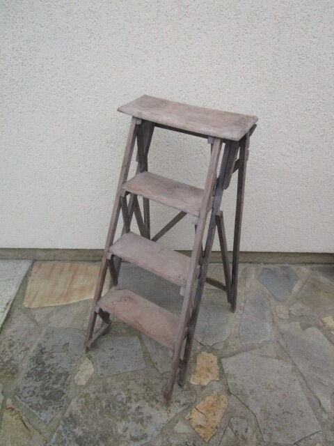 Stepladder of old wooden painted