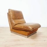 70s lounge chair in camel leather