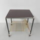 Vintage coffee table on castors with singles rack