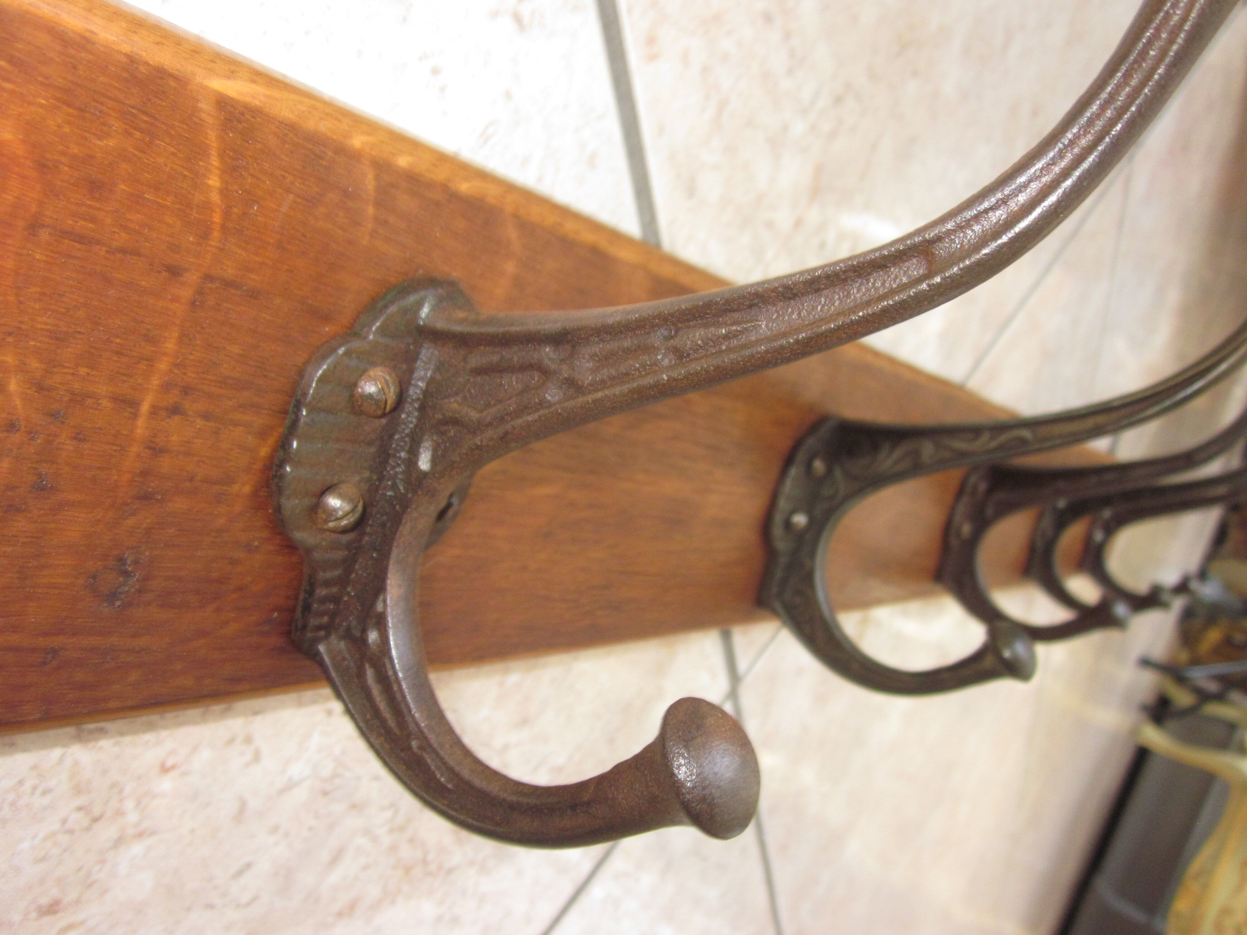 Bistro coat rack has 6 cast iron pads