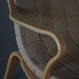 Pair of Swedish armchairs from the mid-century by Bruno Mathsson, model "Eva", 1960s.