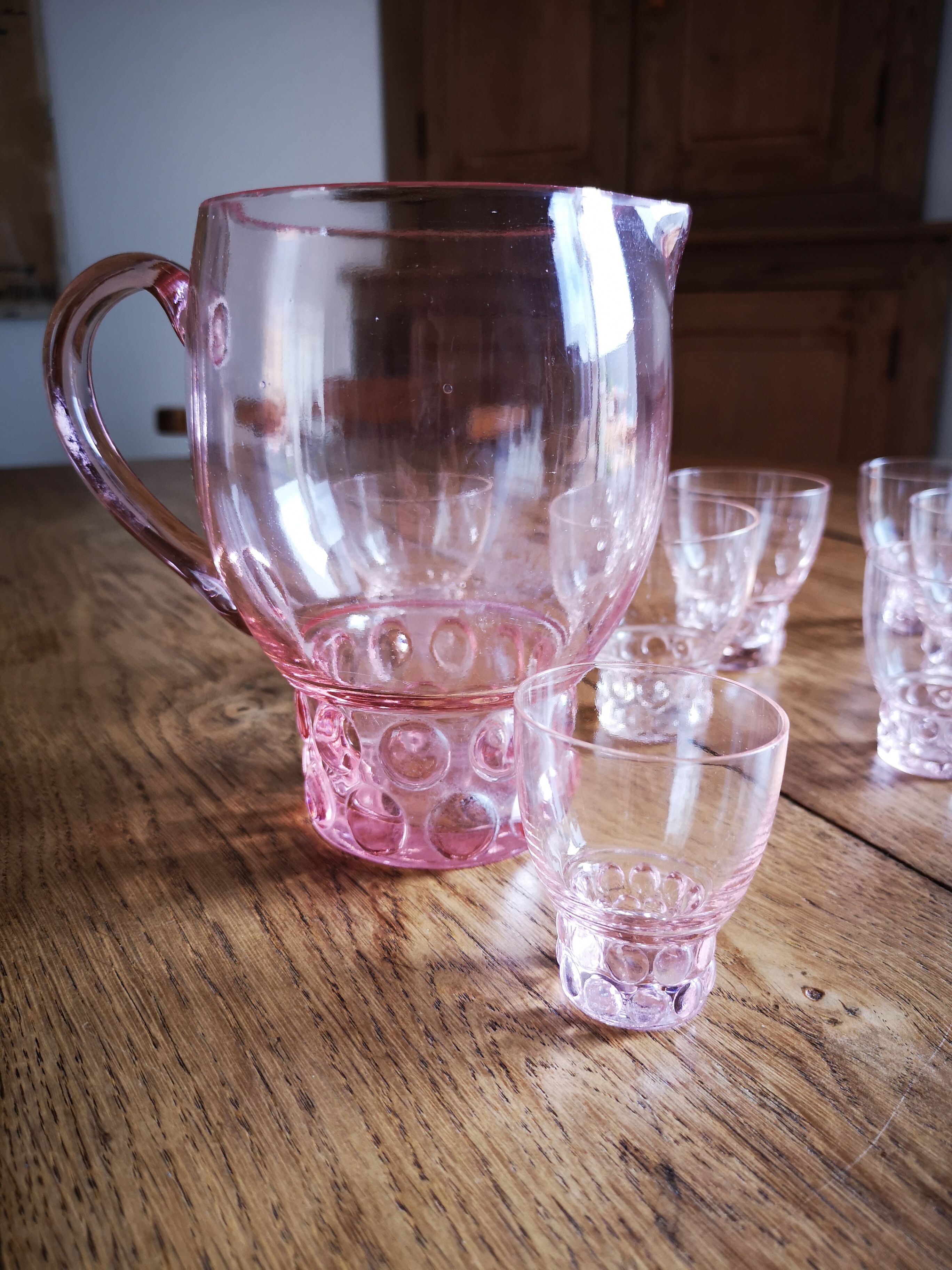 Carafe and water glasses and liqueur