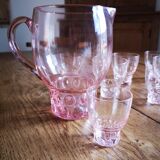 Carafe and water glasses and liqueur