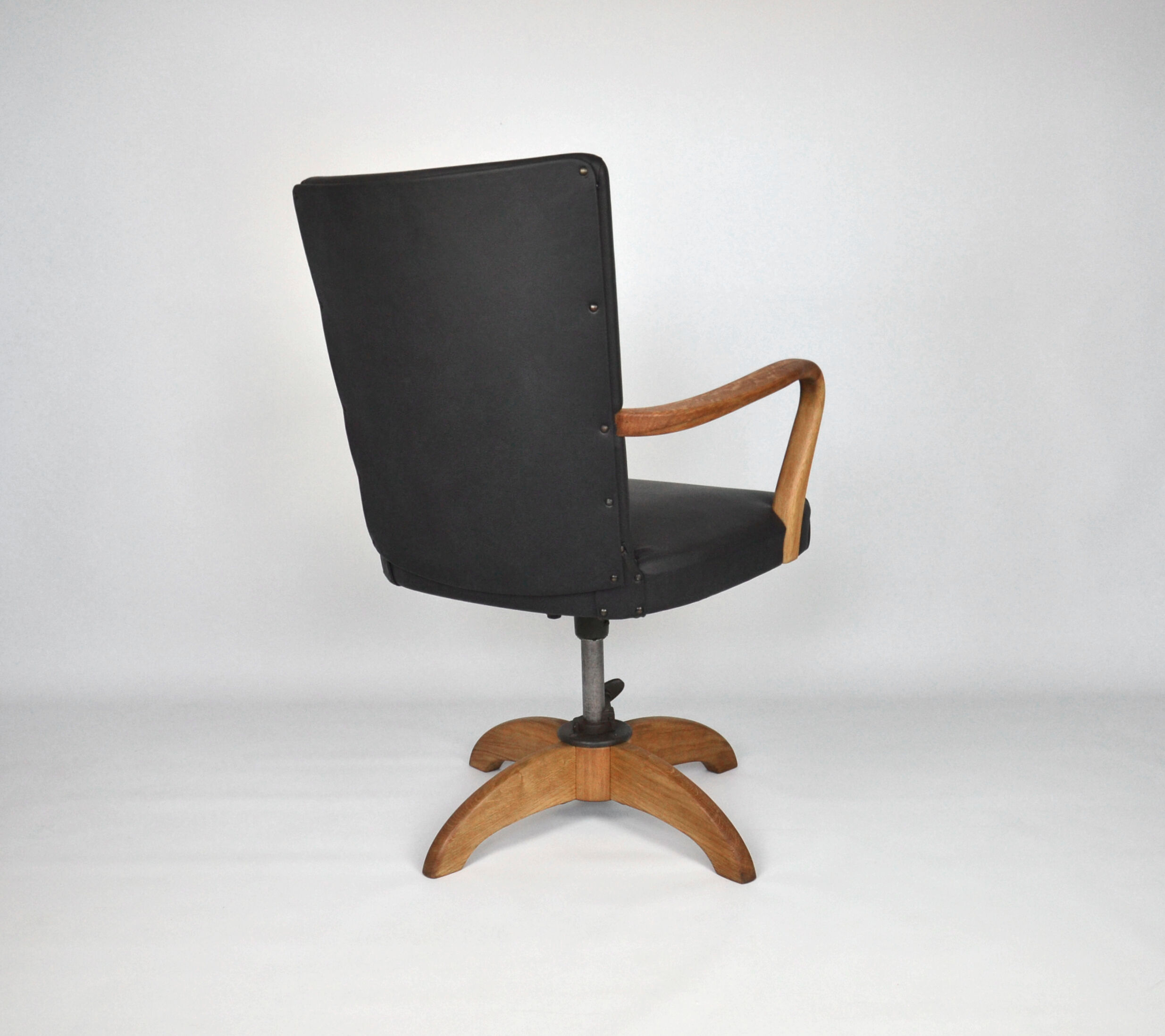 Antique black leather and oak desk chair 1900s, Sweden