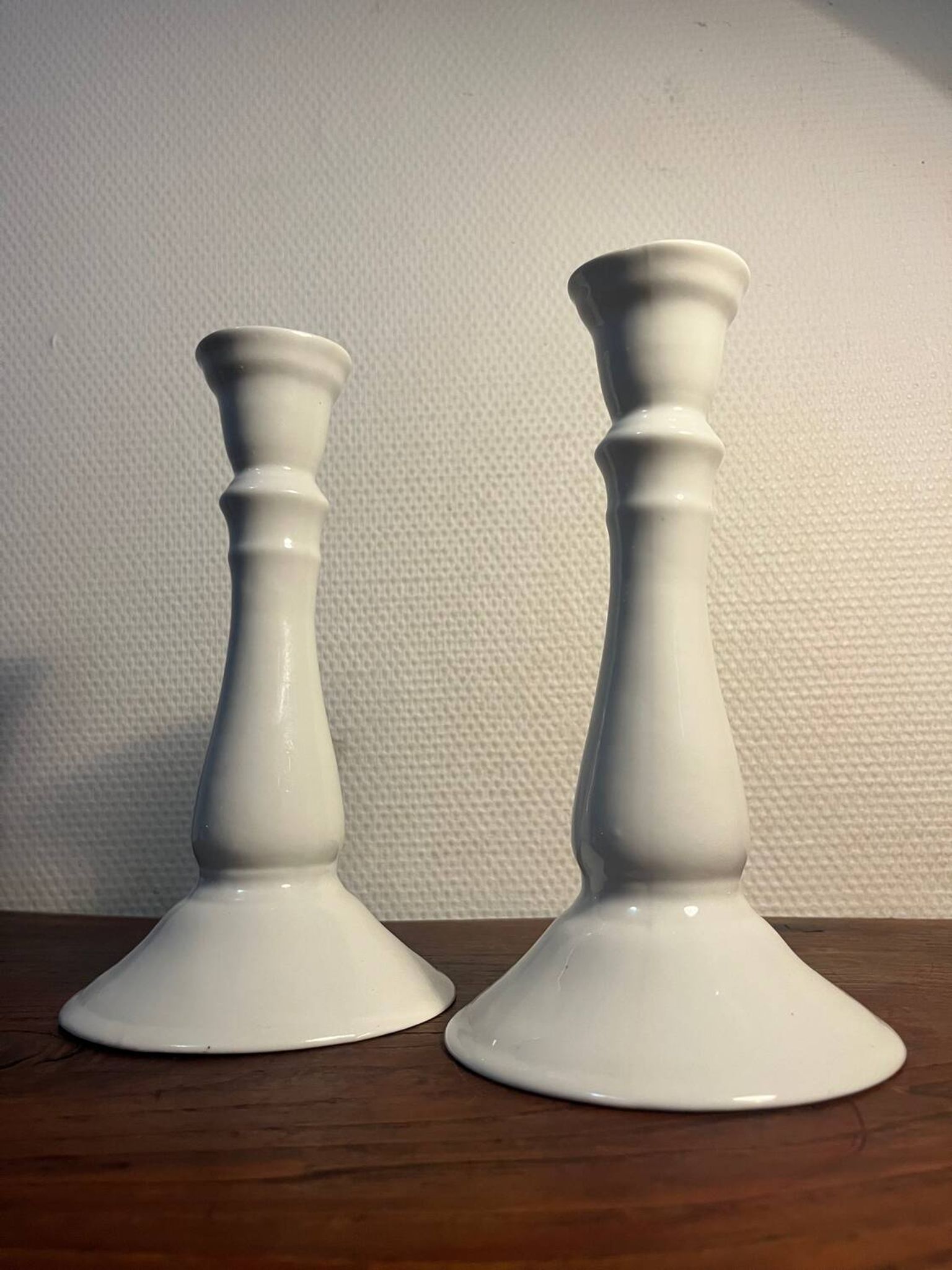 Duo pair of earthenware candlesticks by Maison Huet