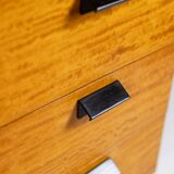 Chest of drawers in varnished blond cherry wood. 1960s.