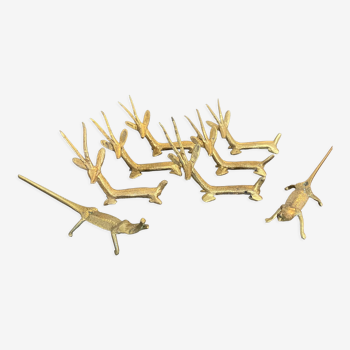 8 porte-couteaux forme antilope et crocodile en laiton