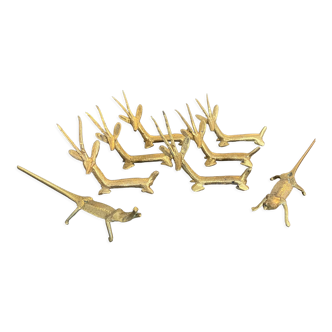 8 brass antelope and crocodile knife holders