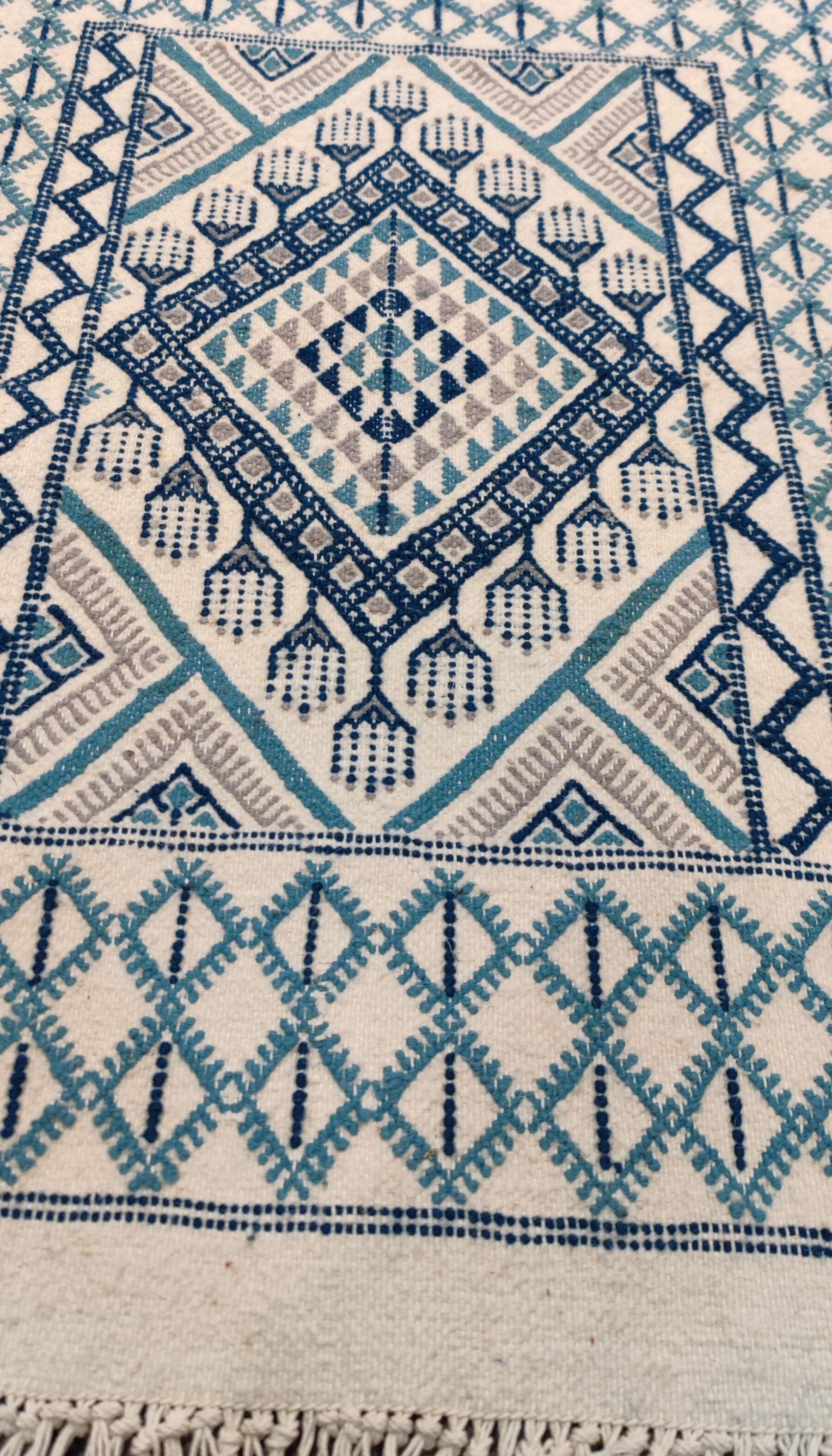 Traditional handmade white blue and gray margoum carpet, 100x72 cm