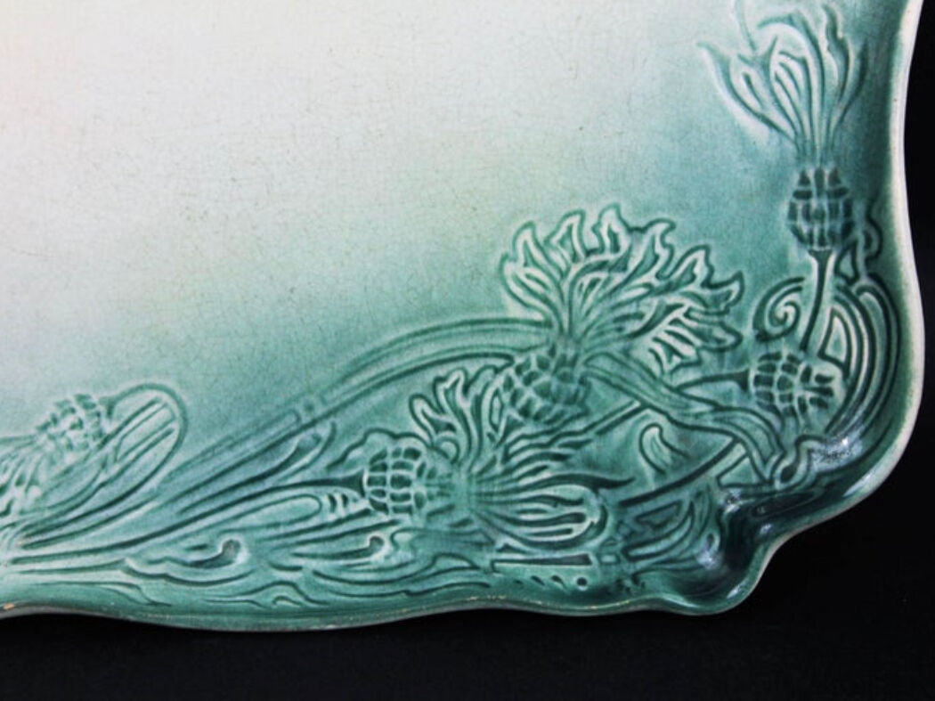 Art Nouveau plate in earthenware decorated with green and pink flowers 1900