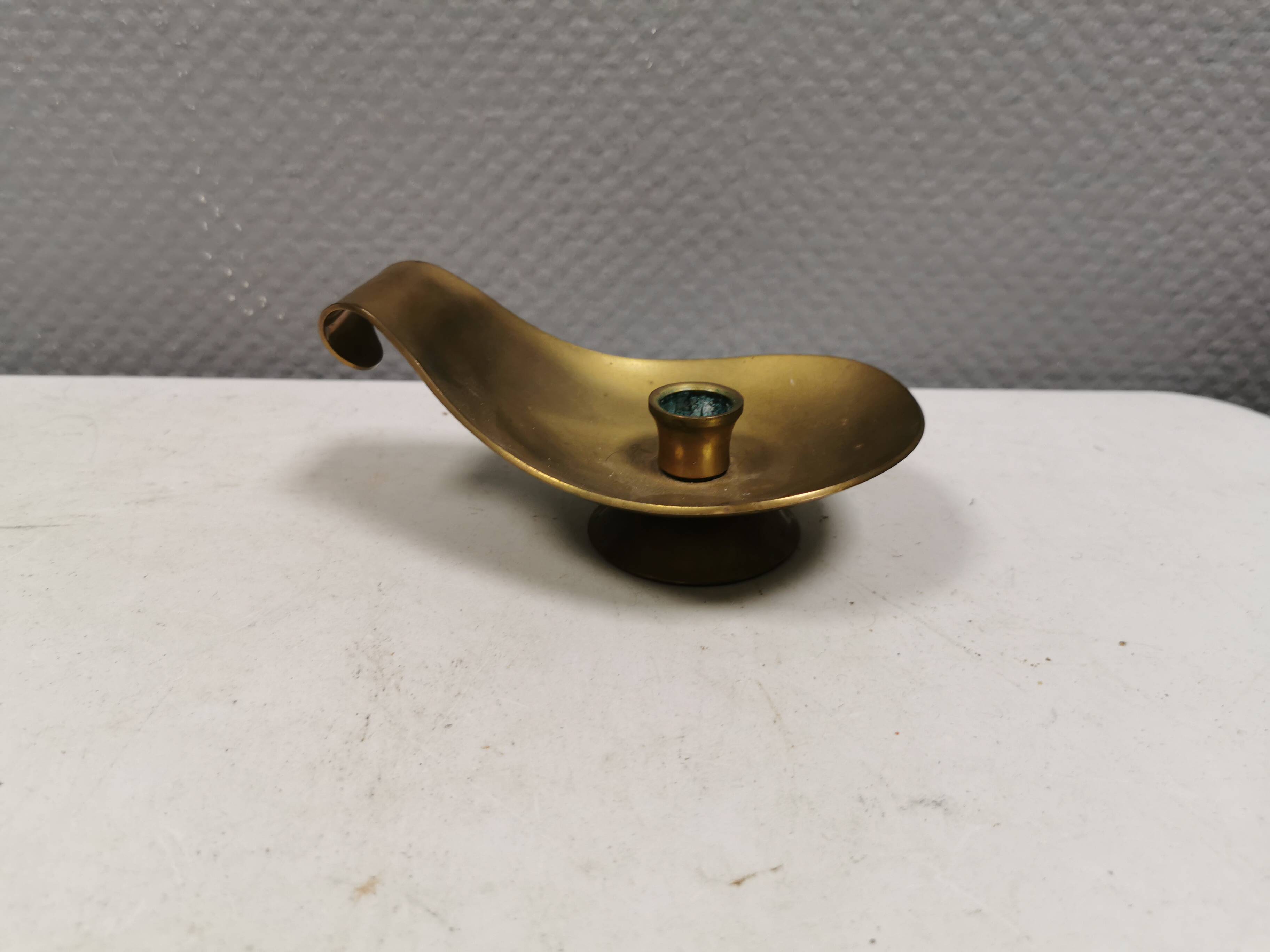 Brass candlestick for a single candle