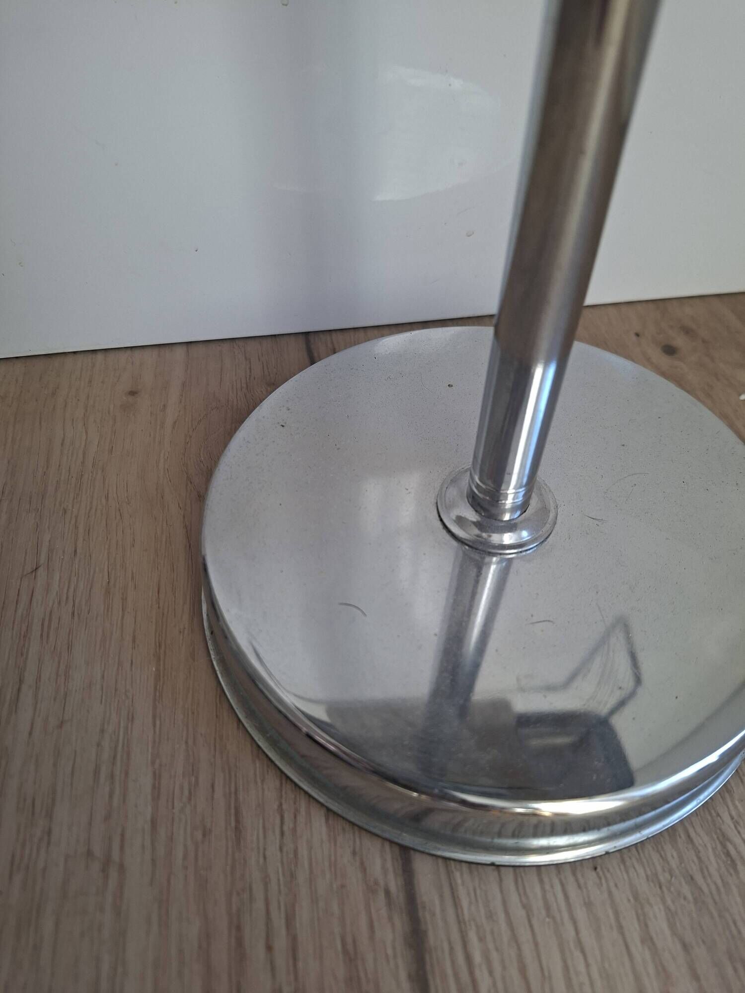 Vintage chrome metal floor ashtray with integrated tray.