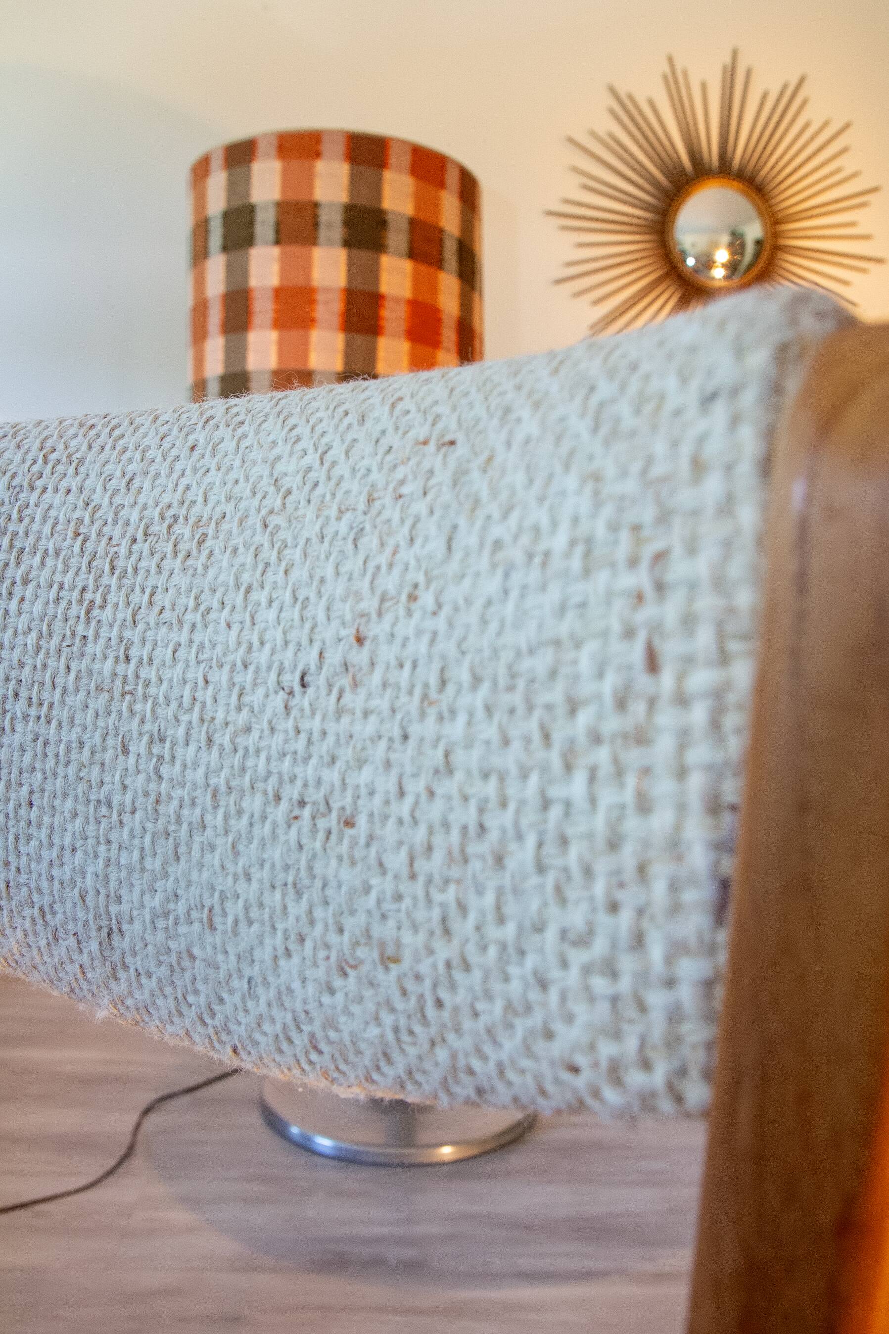 Chair in elm and wool, 1980s.