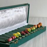 12 ceramic fruit knife holders.