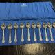 Set of 12 dessert spoons by Mappin and Webb in silver plate.