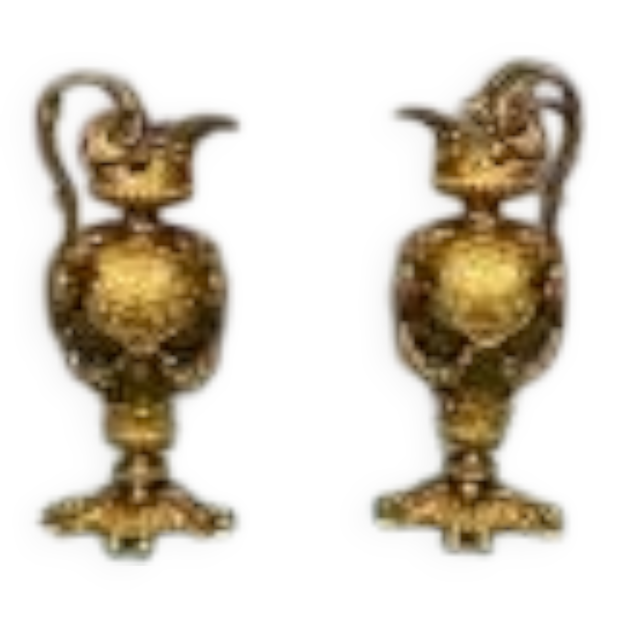 Pair of neo-Renaissance gilt bronze pitchers.