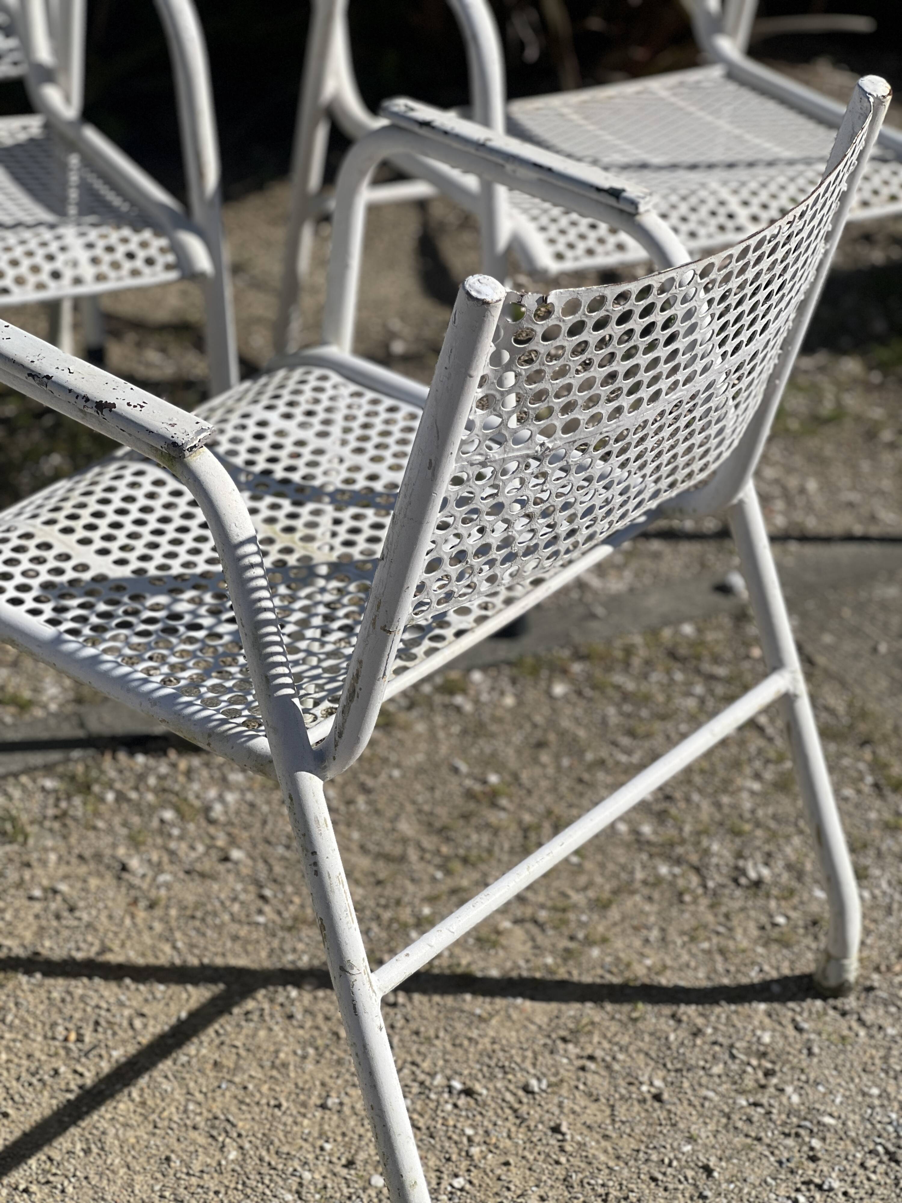 Set of 10 perforated metal garden chairs
