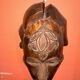 Masque sculpté haut avec des motifs