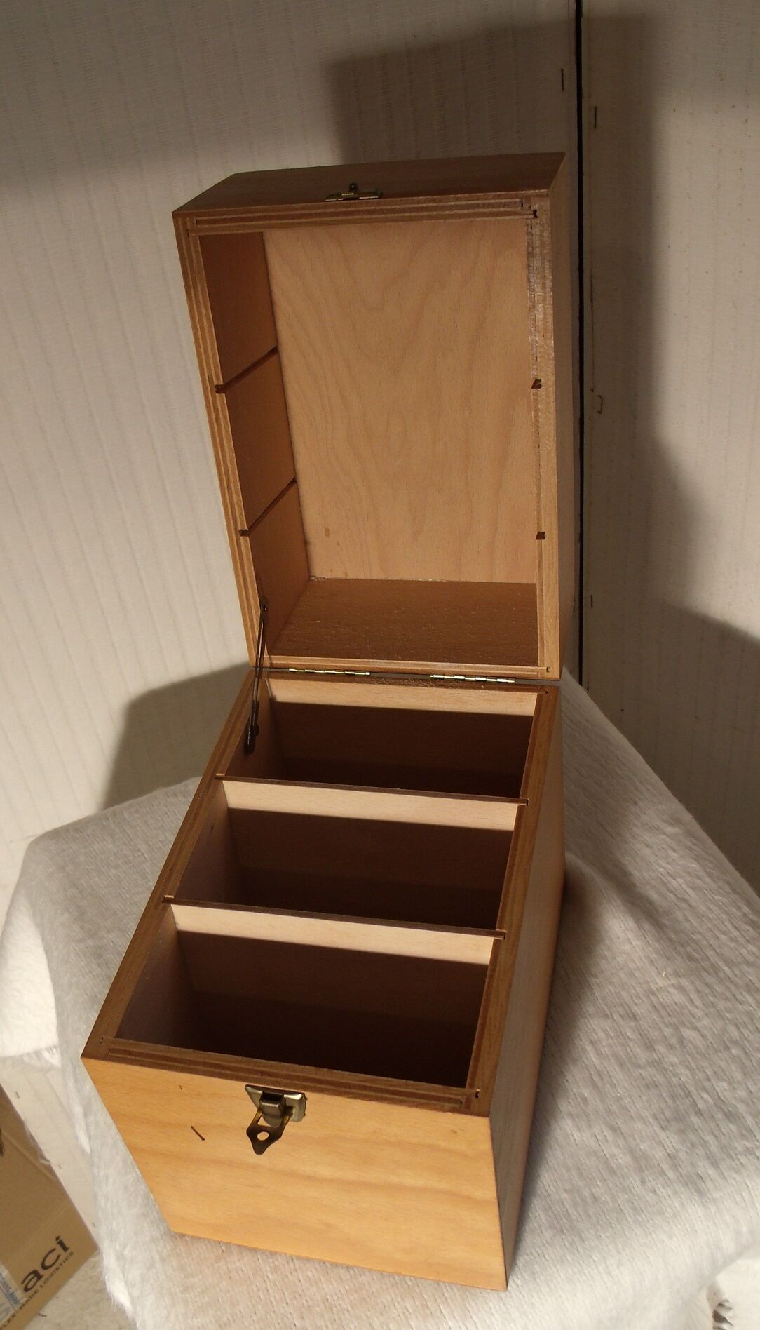 Compartmentalized wooden plug box